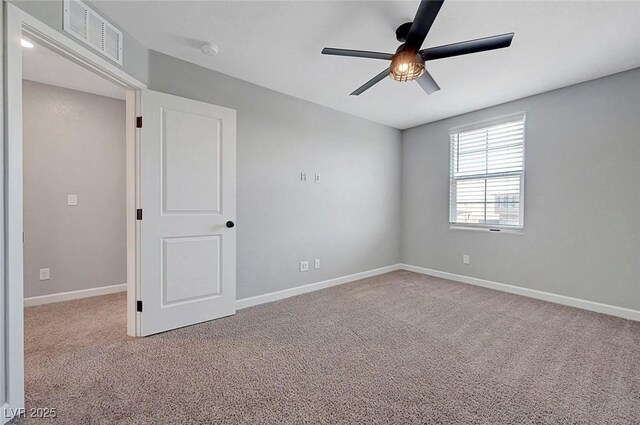 8349 Pollenzo Ave, Las Vegas, NV 89178 - unfurnished room with carpet flooring, ceiling fan, a smoke detector, and baseboards