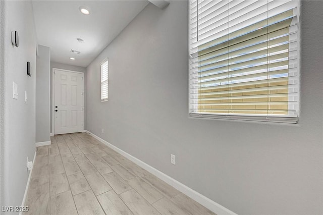 8349 Pollenzo Ave, Las Vegas, NV 89178 - hall featuring baseboards, recessed lighting, and wood finished floors
