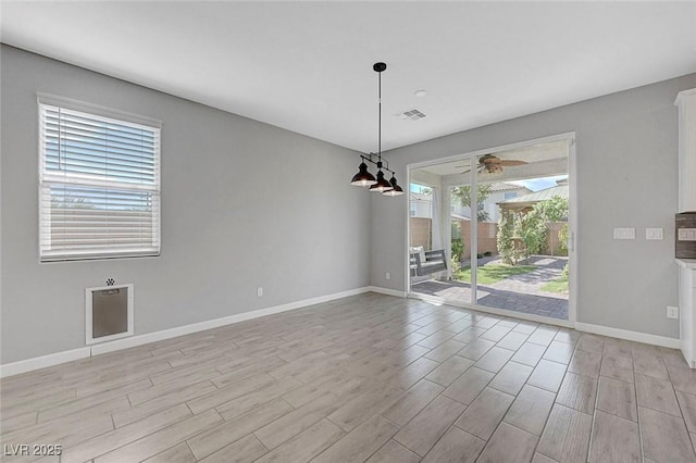 8349 Pollenzo Ave, Las Vegas, NV 89178 - empty room featuring light wood-style flooring, baseboards, and a ceiling fan