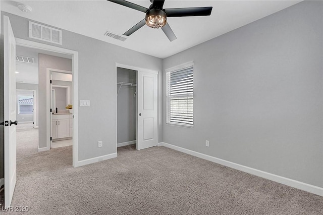 8349 Pollenzo Ave, Las Vegas, NV 89178 - unfurnished bedroom featuring light colored carpet, baseboards, a closet, and ceiling fan
