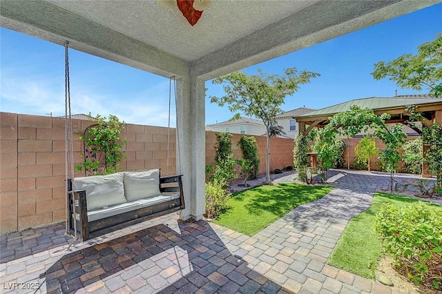 8349 Pollenzo Ave, Las Vegas, NV 89178 - view of patio featuring a gazebo and a fenced backyard