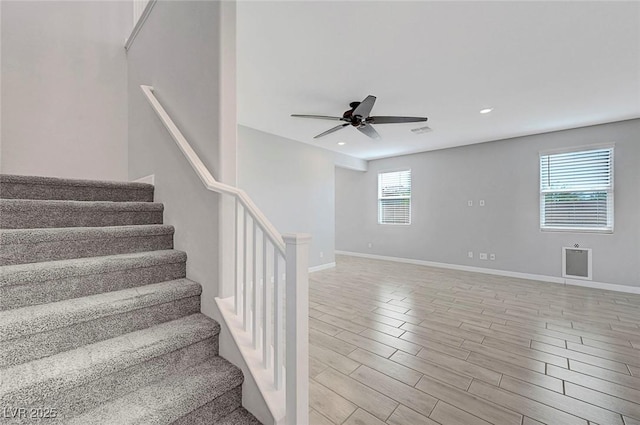 8349 Pollenzo Ave, Las Vegas, NV 89178 - stairs featuring a ceiling fan, baseboards, wood finished floors, and recessed lighting
