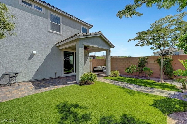 8349 Pollenzo Ave, Las Vegas, NV 89178 - rear view of property with ceiling fan, stucco siding, a patio area, and a tiled roof