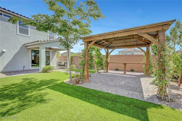8349 Pollenzo Ave, Las Vegas, NV 89178 - view of yard with a gazebo, a ceiling fan, and a patio