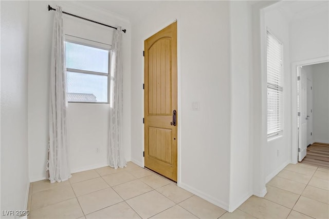 437 Via Stretto Ave, Henderson, NV 89011 - hallway featuring light tile patterned floors and baseboards