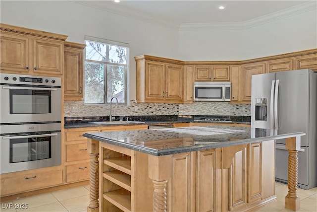 437 Via Stretto Ave, Henderson, NV 89011 - kitchen with a sink, light tile patterned floors, a kitchen island, and stainless steel appliances