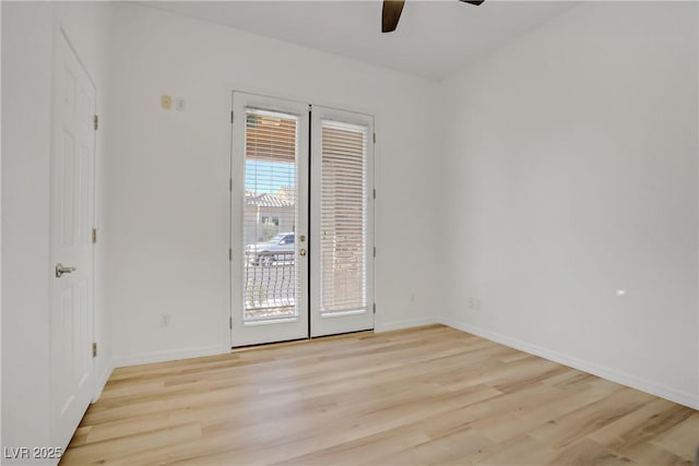 437 Via Stretto Ave, Henderson, NV 89011 - spare room featuring light wood-type flooring, baseboards, ceiling fan, and french doors