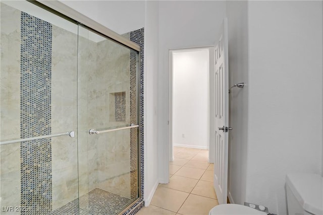 437 Via Stretto Ave, Henderson, NV 89011 - full bathroom with tile patterned flooring, a shower stall, and toilet