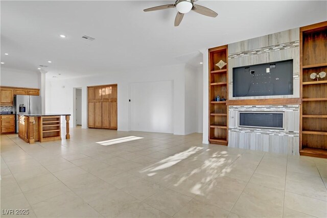 437 Via Stretto Ave, Henderson, NV 89011 - unfurnished living room featuring recessed lighting, visible vents, a ceiling fan, and light tile patterned floors