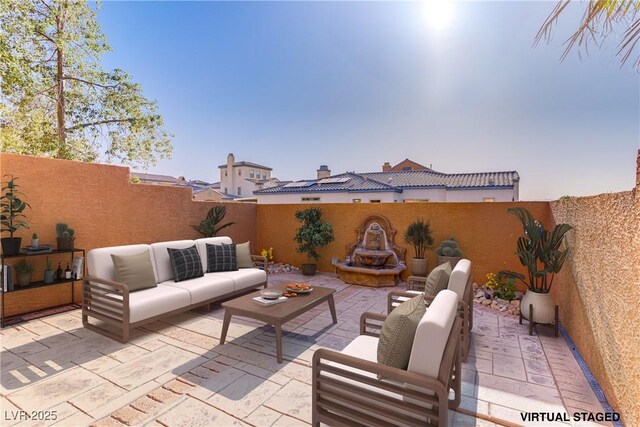 437 Via Stretto Ave, Henderson, NV 89011 - view of patio featuring a fenced backyard and an outdoor living space