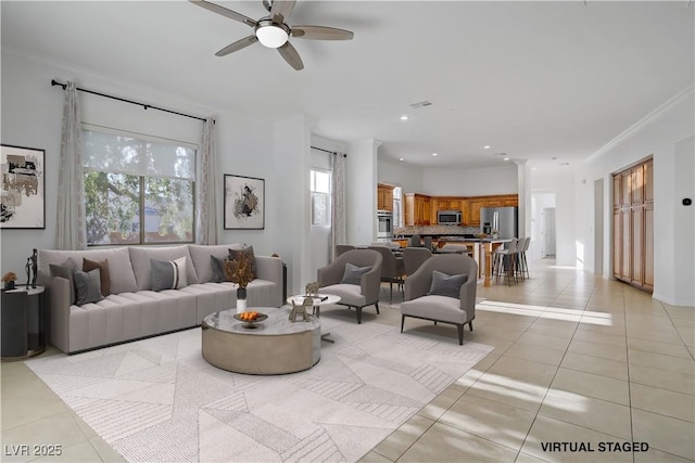 437 Via Stretto Ave, Henderson, NV 89011 - living area with a ceiling fan, recessed lighting, light tile patterned floors, and crown molding