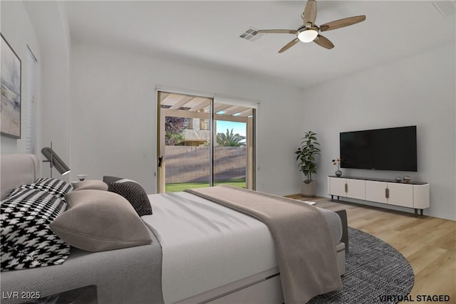 437 Via Stretto Ave, Henderson, NV 89011 - bedroom with visible vents, light wood-style floors, ceiling fan, and access to exterior