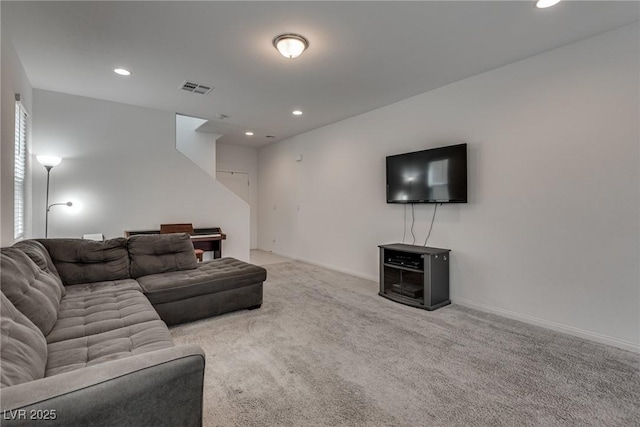 5256 Sherwood Forest Ln, Las Vegas, NV 89122 - living area featuring carpet flooring, baseboards, visible vents, and recessed lighting