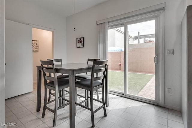 5256 Sherwood Forest Ln, Las Vegas, NV 89122 - dining space with light tile patterned flooring