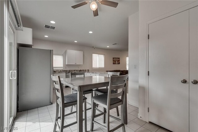 5256 Sherwood Forest Ln, Las Vegas, NV 89122 - dining space featuring light tile patterned floors, a ceiling fan, visible vents, and recessed lighting