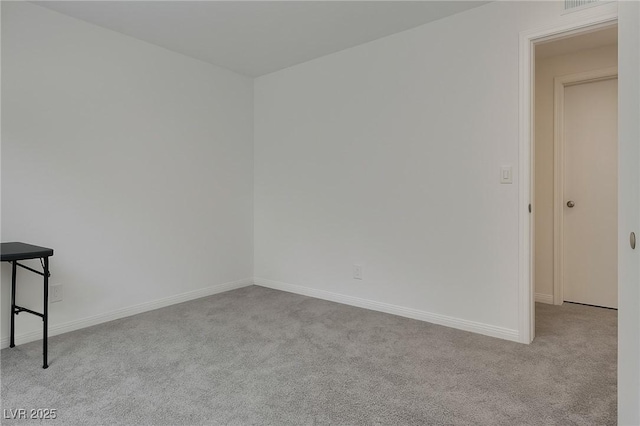 5256 Sherwood Forest Ln, Las Vegas, NV 89122 - carpeted spare room with baseboards