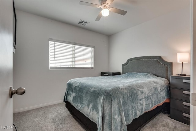5256 Sherwood Forest Ln, Las Vegas, NV 89122 - carpeted bedroom featuring visible vents, baseboards, and ceiling fan