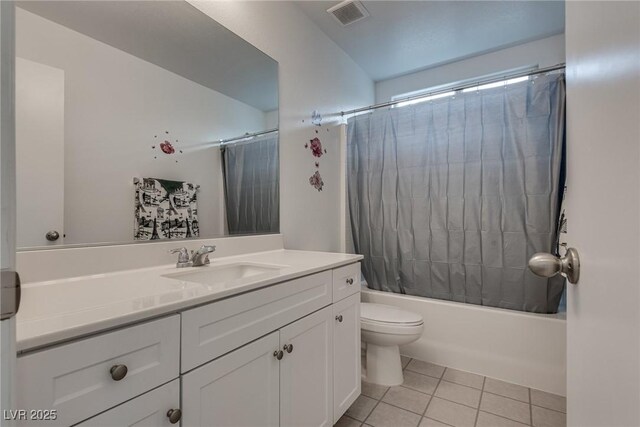 5256 Sherwood Forest Ln, Las Vegas, NV 89122 - full bath with vanity, tile patterned flooring, shower / bath combination with curtain, toilet, and visible vents