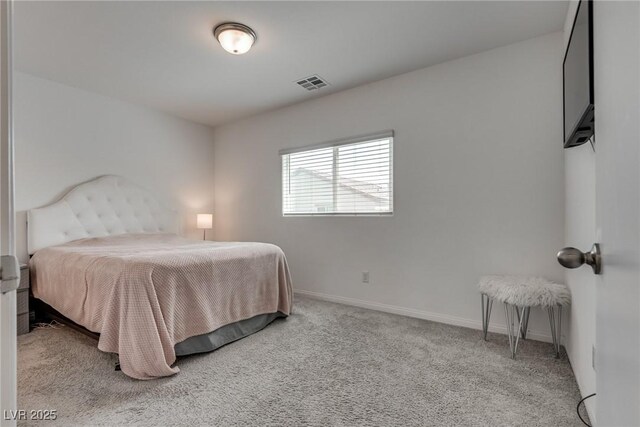 5256 Sherwood Forest Ln, Las Vegas, NV 89122 - carpeted bedroom with baseboards and visible vents