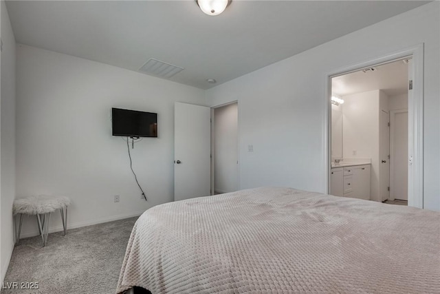 5256 Sherwood Forest Ln, Las Vegas, NV 89122 - bedroom featuring visible vents, baseboards, carpet, and ensuite bath