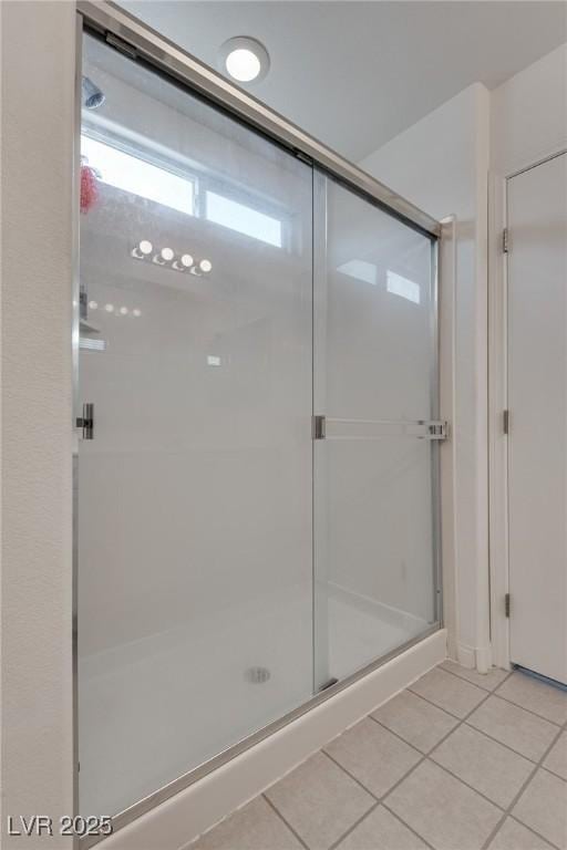 5256 Sherwood Forest Ln, Las Vegas, NV 89122 - full bath featuring a shower stall and tile patterned flooring