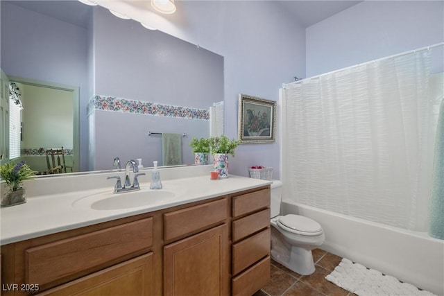 full bath with toilet, tile patterned floors, shower / tub combo with curtain, and vanity