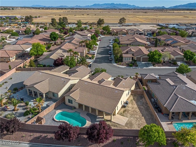 bird's eye view featuring a mountain view and a residential view