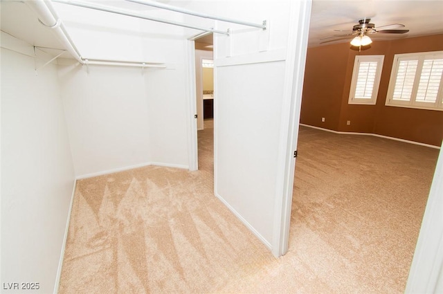 2105 Harbor Cliff Dr, Las Vegas, NV 89128 - spacious closet featuring carpet flooring and ceiling fan