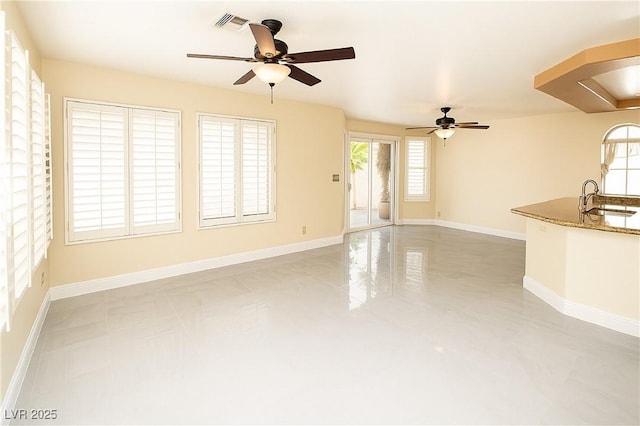 2105 Harbor Cliff Dr, Las Vegas, NV 89128 - unfurnished living room featuring light tile patterned floors and ceiling fan