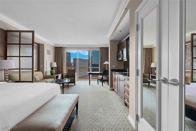 135 E Harmon Ave Unit 2515, Las Vegas, NV 89109 - bedroom with ornamental molding, a sink, light flooring, and baseboards