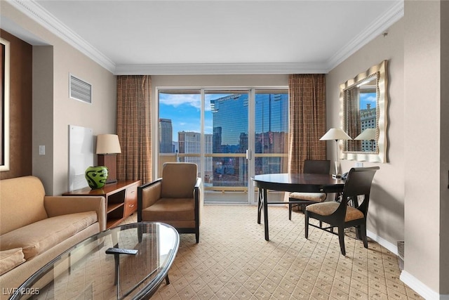 135 E Harmon Ave Unit 2515, Las Vegas, NV 89109 - living area featuring ornamental molding, a city view, and baseboards