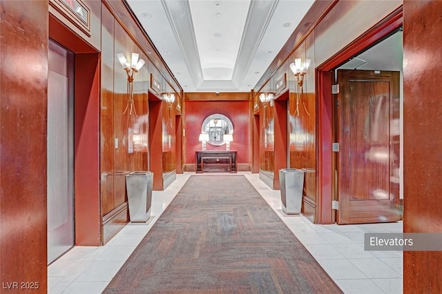 135 E Harmon Ave Unit 2515, Las Vegas, NV 89109 - corridor with light tile patterned floors and a tray ceiling