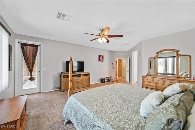 8828 Monte Oro Dr, Las Vegas, NV 89131 - bedroom featuring multiple windows, light colored carpet, and a ceiling fan