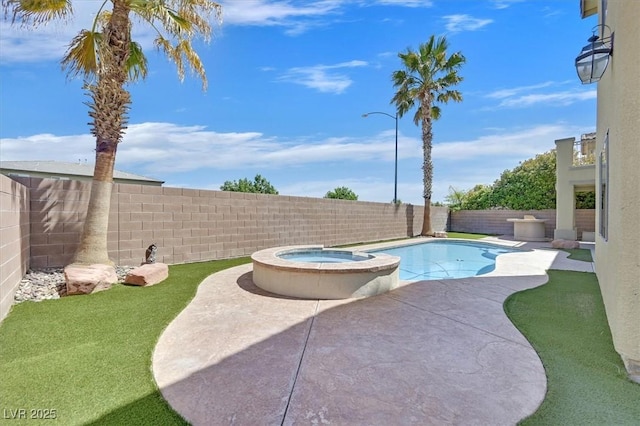 8828 Monte Oro Dr, Las Vegas, NV 89131 - view of swimming pool with a patio area, a fenced backyard, and a pool with connected hot tub