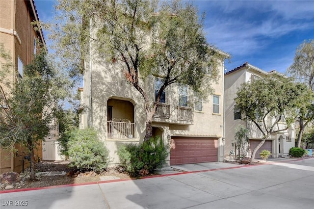 4777 Mereworth Ct, Las Vegas, NV 89130 - multi unit property featuring a garage, stucco siding, and concrete driveway