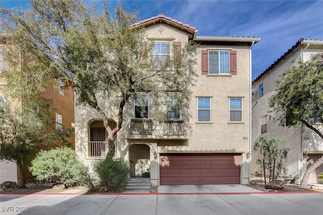 4777 Mereworth Ct, Las Vegas, NV 89130 - view of front of property with a tiled roof, driveway, a garage, and stucco siding