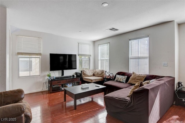 4777 Mereworth Ct, Las Vegas, NV 89130 - living area featuring wood finished floors, baseboards, and visible vents