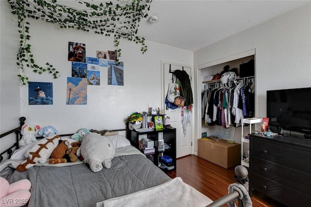 4777 Mereworth Ct, Las Vegas, NV 89130 - bedroom featuring a closet and wood finished floors