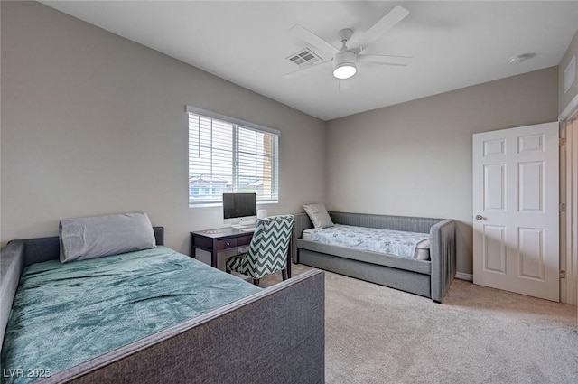 bedroom with visible vents, carpet, and ceiling fan