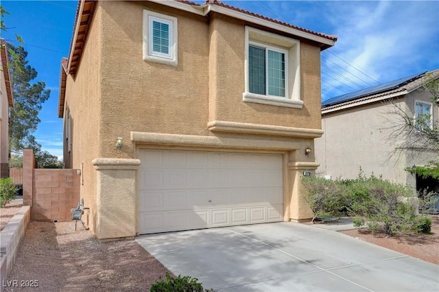11120 Whooping Crane Ln, Las Vegas, NV 89144 - view of front facade with stucco siding, a garage, driveway, and a tile roof