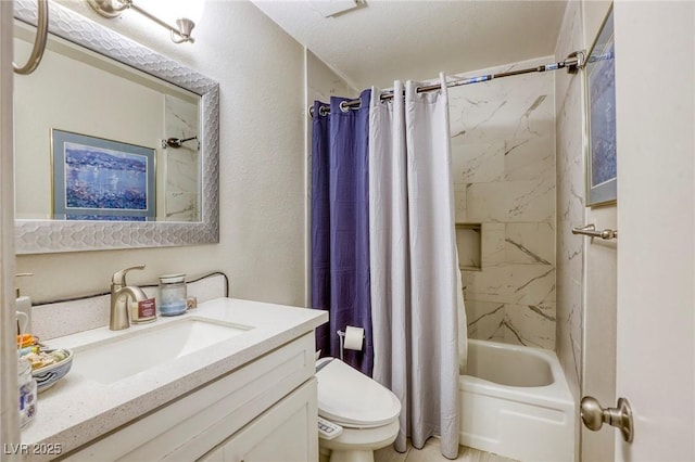 bathroom with a textured wall, shower / bath combination with curtain, vanity, and toilet