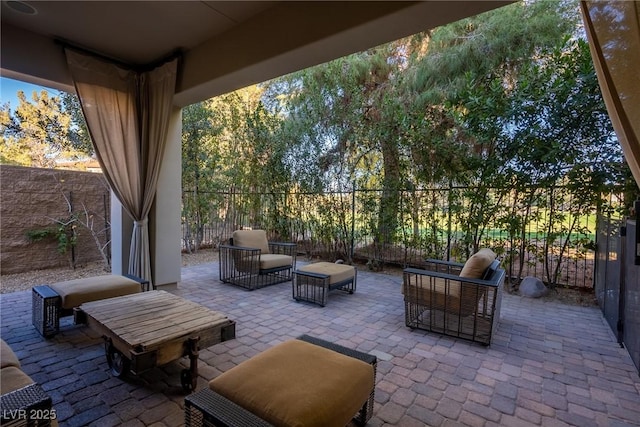 view of patio / terrace with an outdoor hangout area and a fenced backyard