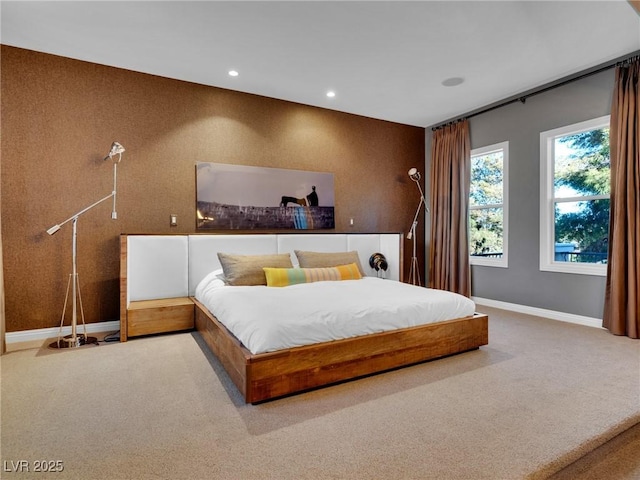 carpeted bedroom with baseboards and recessed lighting
