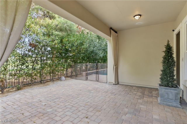 view of patio / terrace with fence