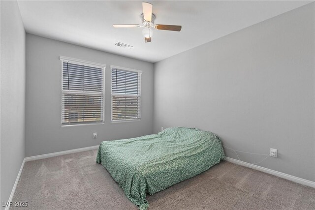 2293 Teatro Ave, Henderson, NV 89044 - carpeted bedroom with baseboards, ceiling fan, and visible vents