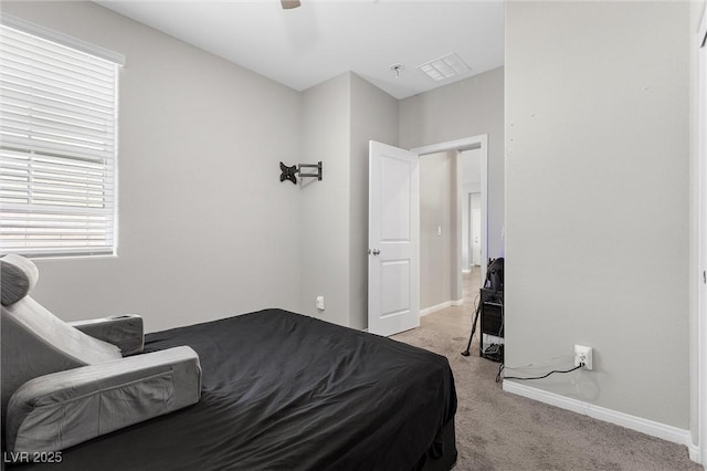 2293 Teatro Ave, Henderson, NV 89044 - bedroom featuring light colored carpet, baseboards, ceiling fan, and visible vents