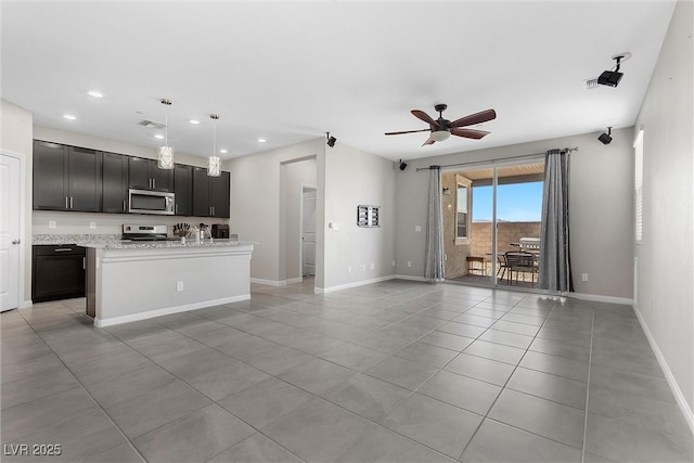 2293 Teatro Ave, Henderson, NV 89044 - unfurnished living room with visible vents, light tile patterned flooring, baseboards, recessed lighting, and a ceiling fan