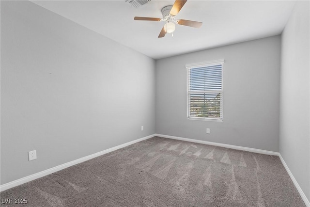 2293 Teatro Ave, Henderson, NV 89044 - spare room with baseboards, a ceiling fan, and carpet flooring