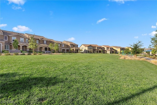 2293 Teatro Ave, Henderson, NV 89044 - surrounding community featuring a yard and a residential view