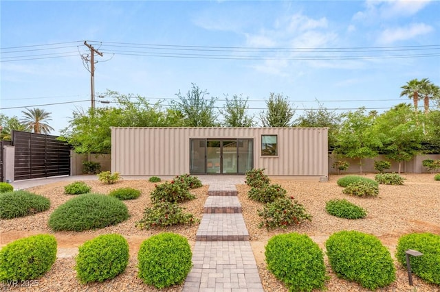 view of outdoor structure with fence